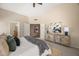 Serene main bedroom features a stylish dresser, soft textures, and a view into the ensuite bathroom at 93 S Sandstone St, Gilbert, AZ 85296