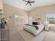 Inviting main bedroom with vaulted ceiling and large windows allowing for plenty of natural light at 93 S Sandstone St, Gilbert, AZ 85296