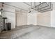 Well lit three car garage offers water filtration system and built in storage cabinets at 1029 E Ian Dr, Phoenix, AZ 85042