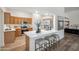 Bright kitchen featuring a breakfast bar, stainless steel appliances, and light wood cabinetry at 1029 E Ian Dr, Phoenix, AZ 85042