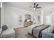 Main bedroom featuring a bench, dresser, and a door to the outside at 1029 E Ian Dr, Phoenix, AZ 85042