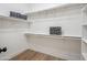 Spacious walk-in closet with ample shelving and storage space, perfect for organization at 1029 E Ian Dr, Phoenix, AZ 85042