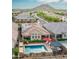 Aerial view of backyard oasis with pool, pergola, and solar panels at 10507 S 181St Ave, Goodyear, AZ 85338