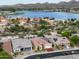 Gorgeous aerial view of the home overlooking the lake and mountain landscape at 10507 S 181St Ave, Goodyear, AZ 85338