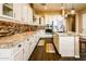 Well-equipped kitchen with granite countertops, stainless steel appliances, and lots of cabinet space at 10507 S 181St Ave, Goodyear, AZ 85338
