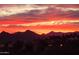 Wonderful sunset view of the desert landscape with mountain silhouettes at 10507 S 181St Ave, Goodyear, AZ 85338