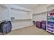Spacious walk-in closet features ample shelving and hanging storage for organization and convenience at 11150 S Star Ct, Goodyear, AZ 85338