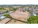 Aerial view of a cleared lot with neighborhood homes, landscaping, ready for new construction at 1137 E 5Th Ave, Mesa, AZ 85204