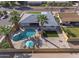 Breathtaking aerial view of the property, highlighting the pool, palm trees, and well-maintained grounds at 1142 E Westchester Dr, Tempe, AZ 85283