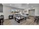 Bright living room showcasing a large sectional sofa, stylish decor, and plenty of natural light at 1142 E Westchester Dr, Tempe, AZ 85283