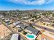Sweeping aerial view of the neighborhood with mountain views showcasing mature trees, nearby parks, and convenient access to local roads at 1209 E Marigold Ln, Tempe, AZ 85288