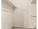 Walk-in closet featuring upper shelving and clothing rod at 13428 N 100Th Ave, Sun City, AZ 85351