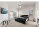 Bedroom boasts a ceiling fan and two windows which let in tons of natural light at 13438 N 130Th Ln, El Mirage, AZ 85335