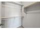 Walk-in closet with a rack and shelf installed for optimal storage space at 13438 N 130Th Ln, El Mirage, AZ 85335