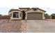 Beautiful single-story home featuring a two-car garage and desert landscaping for a tidy appearance at 13438 N 130Th Ln, El Mirage, AZ 85335