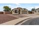Inviting single-story home with desert landscaping, attached two-car garage, and a neutral color palette at 13438 N 130Th Ln, El Mirage, AZ 85335