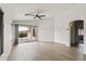 Bright and airy living room with sliding doors leading to an outdoor space at 13438 N 130Th Ln, El Mirage, AZ 85335