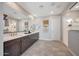 Luxurious bathroom featuring dual vanities, sleek countertops, and a bright, spacious layout at 14837 W Honeysuckle Dr, Surprise, AZ 85387