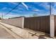 View of the side yard featuring a combination of concrete block and wood fencing for added privacy at 1501 E Sheridan St, Phoenix, AZ 85006