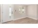 Bright entryway featuring light wood flooring and a modern front door at 1501 E Sheridan St, Phoenix, AZ 85006