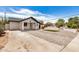 Attractive single-story house featuring xeriscape landscaping and a small lawn at 1501 E Sheridan St, Phoenix, AZ 85006