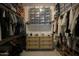 Spacious walk-in closet with custom storage solutions for shoes and clothing at 1529 W State Ave, Phoenix, AZ 85021