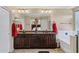 Beautiful bathroom with granite countertops and red accents at 1565 E Prickly Pear Pl, Casa Grande, AZ 85122