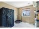 Bedroom featuring personal sauna and window letting in natural light at 1565 E Prickly Pear Pl, Casa Grande, AZ 85122