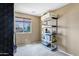 Bedroom featuring a storage shelf and window letting in natural light at 1565 E Prickly Pear Pl, Casa Grande, AZ 85122