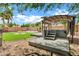 Backyard hot tub with a cover, deck and heater at 1565 E Prickly Pear Pl, Casa Grande, AZ 85122