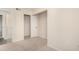 Cozy bedroom with neutral walls, carpet, and a door leading to a closet, complemented by natural light at 1645 W Baseline Rd # 2098, Mesa, AZ 85202