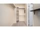 Walk-in closet with built-in shelving and plenty of room for storage at 1645 W Baseline Rd # 2098, Mesa, AZ 85202