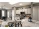 Stylish kitchen showcasing granite counters, stainless steel appliances, and ample natural light at 16514 W Sandia Park Dr, Surprise, AZ 85374