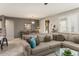 Living room leading to dining area with lots of natural light at 16514 W Sandia Park Dr, Surprise, AZ 85374