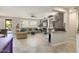 Open-concept living room featuring a modern fireplace, stylish decor, and comfortable seating at 16514 W Sandia Park Dr, Surprise, AZ 85374