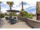 Outdoor living featuring multiple seating areas for relaxing or entertaining at 16514 W Sandia Park Dr, Surprise, AZ 85374