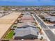New construction homes in a neighborhood featuring desert landscape, wide streets, and mountain views in the distance at 19968 W Flower St, Buckeye, AZ 85396