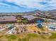 A beautifully maintained community park, featuring modern playgrounds and shaded seating, in a Gathering-friendly neighborhood at 19968 W Flower St, Buckeye, AZ 85396