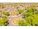 Expansive aerial view of a community with lush greenery, pools, and well-maintained homes at 2102 S Sabrina --, Mesa, AZ 85209