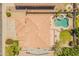Aerial image features the roof, a pool, lush landscaping and a patio area at 2102 S Sabrina --, Mesa, AZ 85209