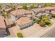 Two-story home featuring a beautiful pool, well-kept landscaping, and three-car garage in a suburban neighborhood at 2102 S Sabrina --, Mesa, AZ 85209