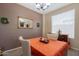 Dining area featuring natural light, a decorative mirror, a table, and chairs at 2102 S Sabrina --, Mesa, AZ 85209