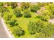 Aerial view of a park featuring mature trees, grassy areas, and walking paths at 2102 S Sabrina --, Mesa, AZ 85209