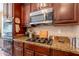 Close up view of kitchen featuring stainless steel appliances and granite countertops at 2102 S Sabrina --, Mesa, AZ 85209