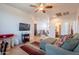 Comfortable living room features stylish furniture and an entertainment area at 2102 S Sabrina --, Mesa, AZ 85209