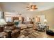 Open-concept living room with neutral tones and stylish furnishings at 2102 S Sabrina --, Mesa, AZ 85209