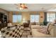 Cozy living room with comfortable furniture and a neutral color palette at 2102 S Sabrina --, Mesa, AZ 85209
