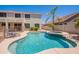 Backyard pool and spa with landscaping and covered patio at 2102 S Sabrina --, Mesa, AZ 85209