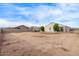 Large, open backyard with potential for landscaping and recreational activities at 2614 S 120Th Ave, Avondale, AZ 85323