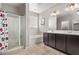 Bathroom with shower, bath, and double sink vanity at 2614 S 120Th Ave, Avondale, AZ 85323